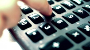 stock-footage-businessman-using-a-calculator